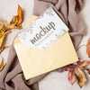 Flat Lay Autumn Mock-Up With Leaves On Grey Cloth Psd