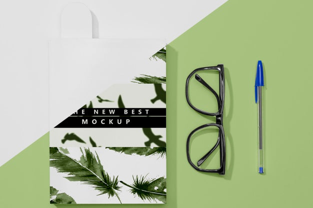 Flat Lay Book Mock-Up With Glasses And Pen Psd