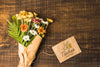Flat Lay Bouquet Of Flowers With Mock-Up Tag Psd