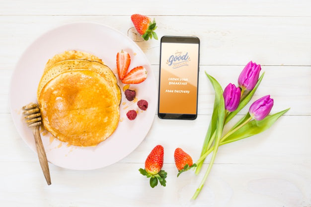 Flat Lay Breakfast With Pancakes Next To Smartphone Psd