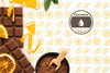 Flat Lay Chocolate With Orange Background Mock-Up Psd