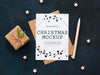 Flat Lay Christmas Eve Composition With Card And Envelope Psd