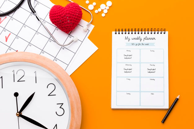 Flat Lay Clock On Orange Background Psd