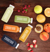 Flat Lay Colorful Smoothies Next To Fruits Mock-Up Psd
