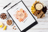 Flat Lay Composition Of Snacks With Clipboard Mock-Up Psd