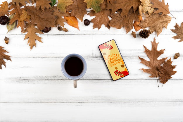 Flat Lay Decoration With Leaves And Phone Psd