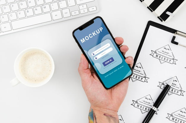 Flat Lay Hand Holding Smartphone Mock-Up Psd