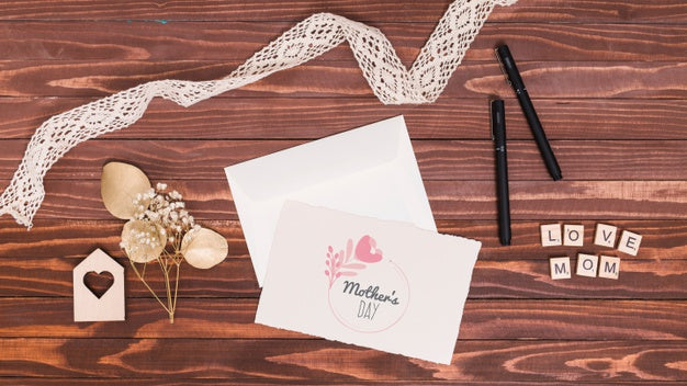 Flat Lay Mothers Day Composition With Card Mockup Psd