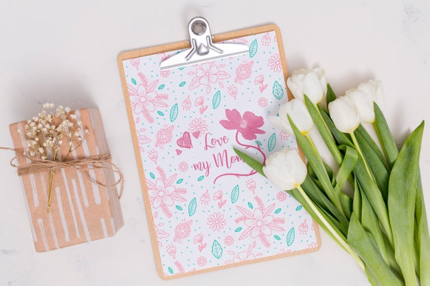 Flat Lay Mothers Day Composition With Clipboard Mockup Psd