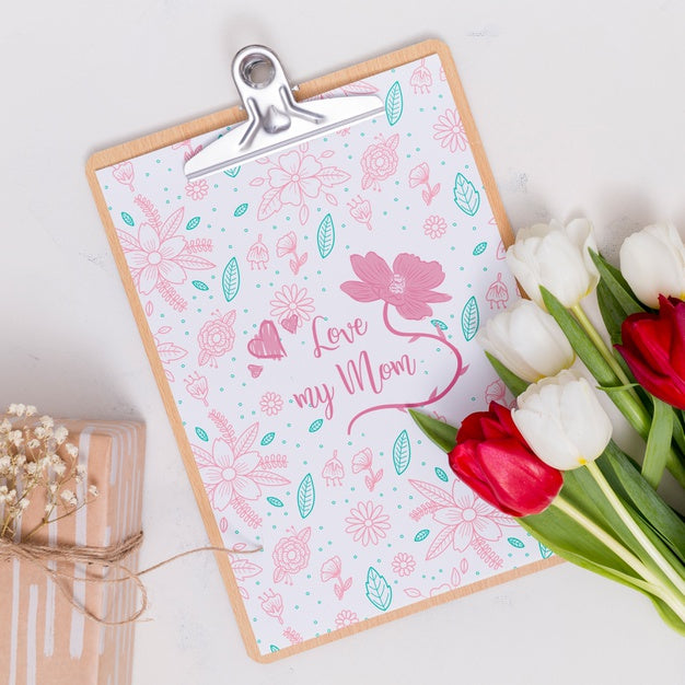 Flat Lay Mothers Day Composition With Clipboard Mockup Psd
