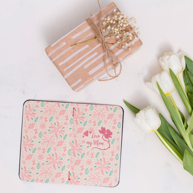 Flat Lay Mothers Day Composition With Open Book Mockup Psd