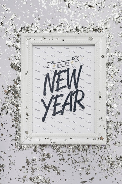 Flat Lay New Year Lettering On Frame Mock-Up With Confetti Psd