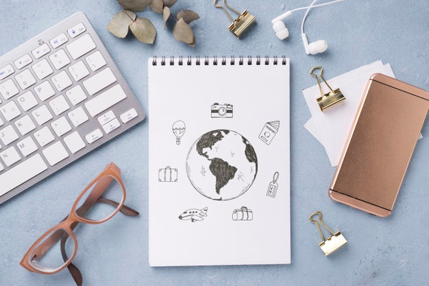 Flat Lay Notebook Mock-Up And Stationery Near Glasses And Keyboard Psd