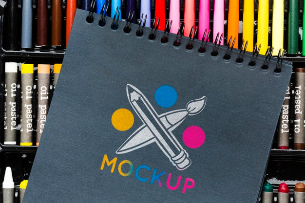 Flat Lay Notebook On Colorful Markers Psd