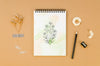 Flat Lay Notepad Mock-Up On Brown Background Psd