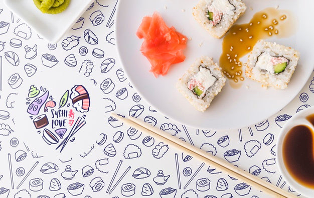Flat Lay Of A Plate Of Sushi And Soy Sauce Psd