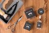 Flat Lay Of Barbershop Products With Scissors And Serum Psd