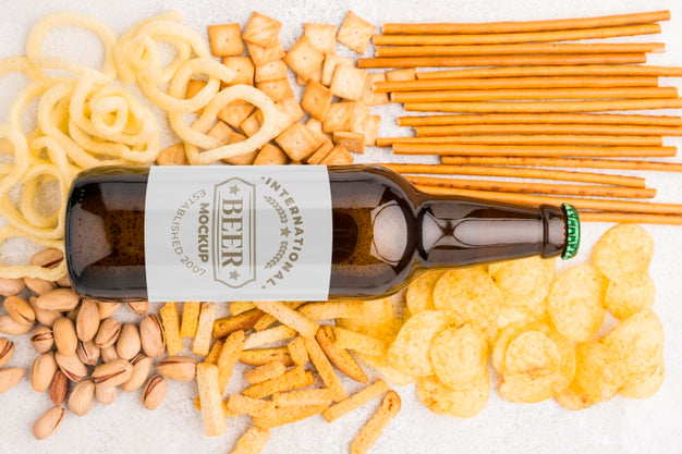 Flat Lay Of Beer Bottle With Assortment Of Snacks Psd