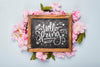 Flat Lay Of Blackboard With Spring Flowers Psd
