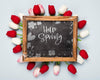 Flat Lay Of Blackboard With Spring Tulips Psd