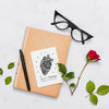 Flat Lay Of Book With Glasses And Rose Psd