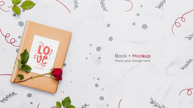 Flat Lay Of Book With Rose Psd