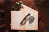 Flat Lay Of Books With Glasses And Flowers Psd