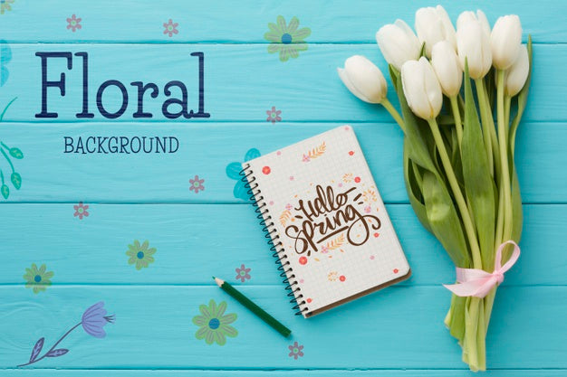 Flat Lay Of Bouquet Of Tulips With Notebook Psd