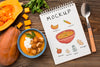 Flat Lay Of Bowl Of Vegetable Soup With Notebook Psd