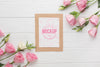 Flat Lay Of Card Mock-Up With Pink Roses Psd