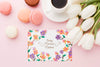 Flat Lay Of Card With Macarons And Tulips Psd