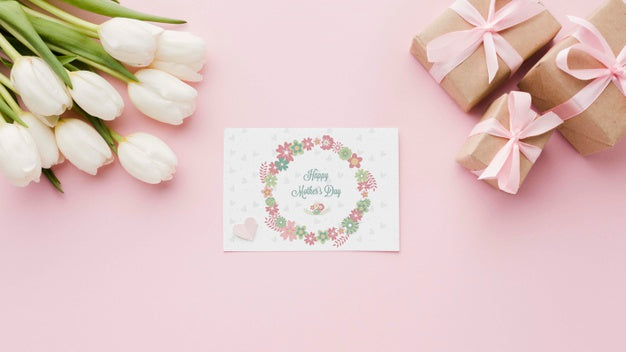 Flat Lay Of Card With Tulips And Presents Psd