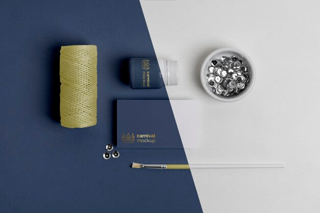 Flat Lay Of Carnival Invitation With Thread And Paint Brush Psd