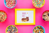 Flat Lay Of Cereal Bowls And Frame With Pink Background Psd
