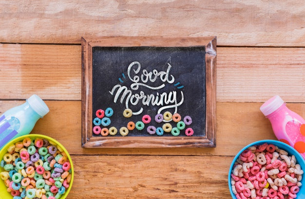 Flat Lay Of Chalkboard And Cereals On Wooden Table Psd