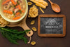 Flat Lay Of Chalkboard With Bowl Of Soup Psd
