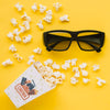 Flat Lay Of Cinema Popcorn In Cup With Glasses Psd