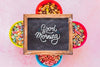 Flat Lay Of Colorful Cereals And Chalkboard On Plain Background Psd