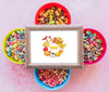 Flat Lay Of Colorful Cereals And Frame On Plain Background Psd