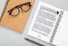 Flat Lay Of Desk Surface With Notebooks And Glasses Psd