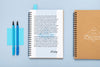 Flat Lay Of Desk Surface With Notebooks And Pens Psd