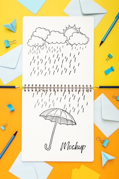 Flat Lay Of Desk Surface With Notepad And Pencils Psd