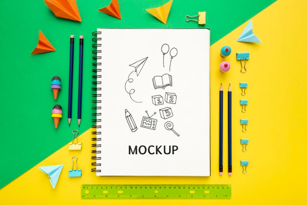 Flat Lay Of Desk Surface With Notepad And Ruler Psd