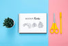 Flat Lay Of Desk Surface With Notepad And Scissors Psd