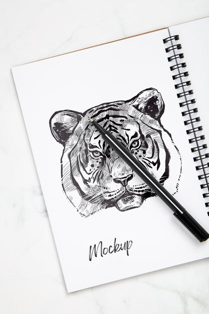 Flat Lay Of Desk Surface With Pen And Notebook Psd