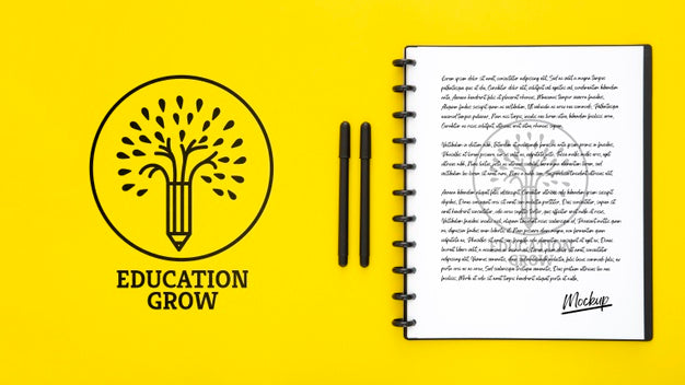 Flat Lay Of Desk Surface With Pens And Notebook Psd