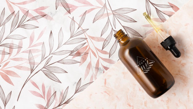 Flat Lay Of Essential Oil Bottle And Pipette Psd