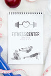 Flat Lay Of Fitness Notebook With Measuring Tape And Apple Psd