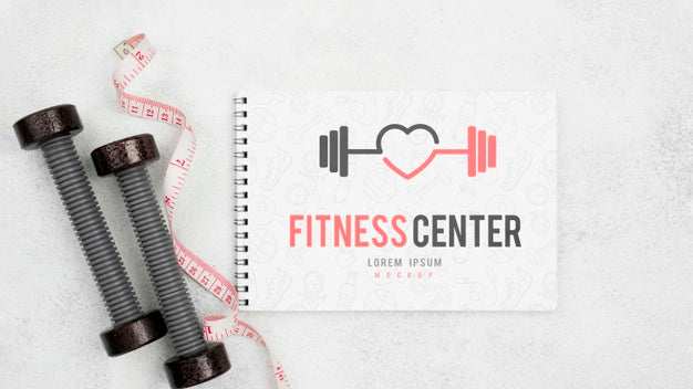 Flat Lay Of Fitness Notebook With Weights And Measuring Tape Psd