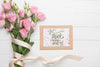 Flat Lay Of Frame And Bouquet On Wooden Background Psd